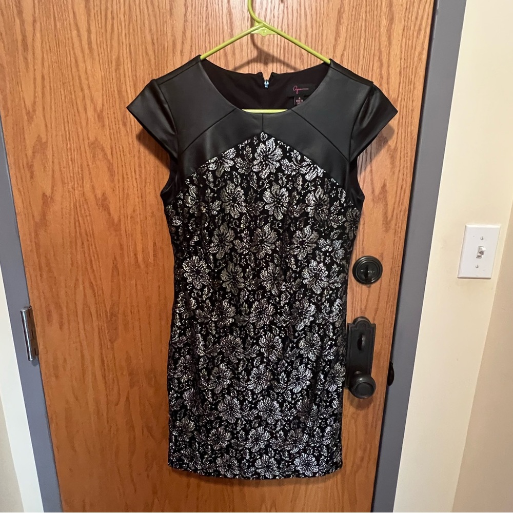 Cute, silver and black mini dress perfect for wedding or cocktail event.